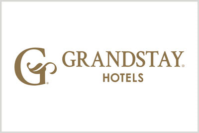 GrandStay Hotels logo